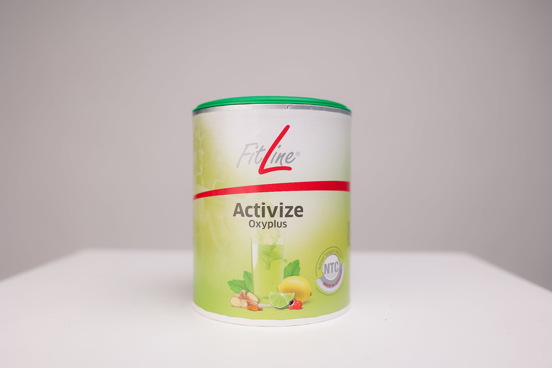 FitLine Activize Oxyplus energijos milteliai su juodaisiais serbentais ir imbieru - sidabrinė dėžutė su NTC ženklu